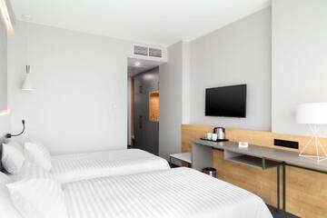 Фото номера Стандартный двухместный номер с 2 отдельными кроватями Отель Hotel ATRIUM г. Могилев 3